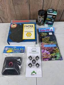 lot 1030 image: Assortment of NEW Aquarium Accessories (Filter Foam, Hatchery Kit, Aquavitro Shrimp Cubes, Poly-Filter, Pump, Algae Bites)