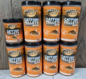 lot 948 image: Set of 8 Omega One Sinking Catfish Pellets with Salmon and Shrimp, Assorted Sizes