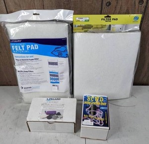 lot 1011 image: Collection of 2 New Filter Pads, 1 Lifegard Aquatics Scratch Removal Kit & 1 SCWD