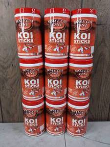 lot 920 image: Collection of 9 Containers of Omega One Floating Koi Sticks (8 oz)