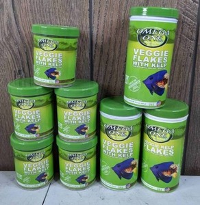 lot 928 image: Set of 8 Omega One Veggie Flakes with Kelp, Assorted Sizes