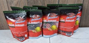 lot 1061 image: 9 NEW Bags Omega One Frozen Super Brine Shrimp Spirulina Enriched, 4 oz. Pkg.