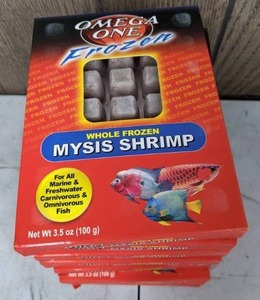 lot 1201 image: 9 NEW Packages of Omega One Whole Frozen Mysis Shrimp, 3.5 oz. Pkg.