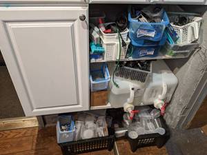 lot 1190 image: Large Assortment of Supplies Used with Betta Fish Containers, Strainers, Water and More