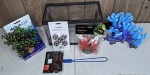 lot 1191 image: Small Aquarium Setup with Tank, Coral, Plants, Net and Other Accessories (Aquatop, Aquavitro, Aqualife Plantscapes)