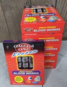 lot 1198 image: 7 NEW Packages of Omega One Whole Frozen Blood Worms, (One 3.5 oz. Pkg., Six 7 oz. Pkgs.)