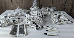 lot 1465 image: Stockpile of Weasel Fat Silicone Lubricant and Two Packages of 7-Acres Ultra-Activated Filter Carbon
