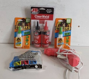 lot 1448 image: Office Supplies Gorrila Super Glue Gel, JB Weld Clear Weld, & Glue Gun w Glue Sticks