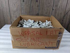 lot 1299 image: Large Box of Weasel Fat Silicone Lubricant Tubes