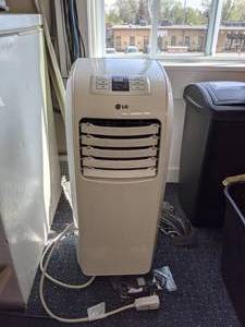 lot 1389 image: LG LP0711WNR 7,000 Cooling Capacity (BTU) Portable Air Conditioner