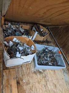 lot 1394 image: Large assortment of Slatwall Peg Hooks and Shelf Brackets. Silver
