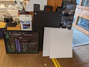 lot 1395 image: Assortment of Sign Display Stands Signicade Black Sign Stand, Hanging Chalk board and More