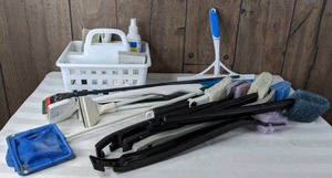 lot 1510 image: Aquarium Cleaning Tools Tote, Scrapers, Scrub Brushes, API Safe & Easy Cleaner, The Watchdog Water Alarm and More