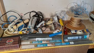 lot 1515 image: Garage Treasures Power Strips, Carpet Trim, Rope, Plastic Tubing, Fabric Care Kit and Much More