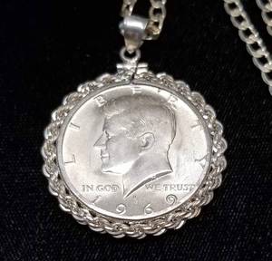 lot 03 image: 1969 KENNEDY 40% SILVER HALF DOLLAR IN STERLING SILVER NECKLACE