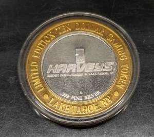 lot 19 image: .999 FINE SILVER 1997 BILL COSBY HARVEYS CASINO TOKEN .6 TROY OZ .999 FINE