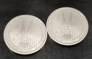 lot 48 image: 1 TROY OZ .999 FINE SILVER (2)  OZ 2013 WAR IN THE PACIFIC ROUNDS