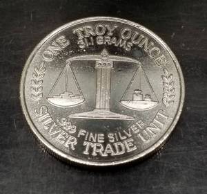 lot 52 image: 1 TROY OZ .999 FINE SILVER DUCKS UNLIMITED TRADE UNIT