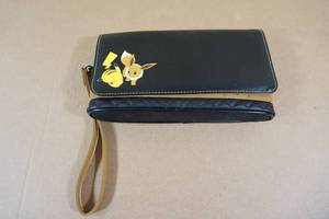 lot 75 image: Nintendo Switch Pikachu and Eevee Pokemon Carry Case