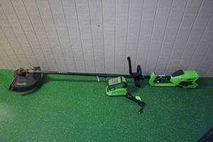 lot 121 image: GreenWorks DigiPro Brushless Cordless 40V String Trimmer