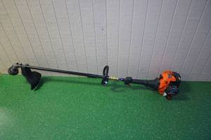 lot 122 image: Remington Rustler RM2560 Gas String Trimmer