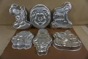 lot 227 image: Wilton Cake Pans - Mickey, Big Bird, Bert and Ernie