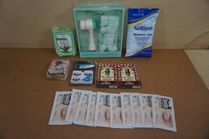 lot 241 image: Facial Care Products - Facial Brush, Eye Patches, Lip Balm