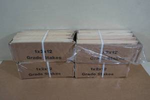 lot 33 image: 1 x 2 x 12 Wooden Grade Stakes