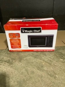 Magic Chef 0.7 cu. ft. Countertop Microwave in Black with Gray Cavity. See Pictures