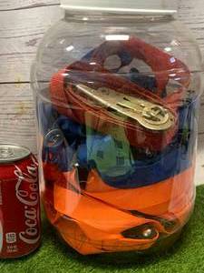 lot 22 image: Jar of Tie Down Ratchet Straps