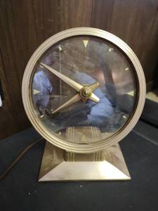 lot 56 image: Haddon Golden Vision Electronic Clock