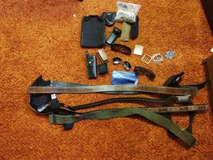 lot 60 image: Collection of Gun Accessories, Belts, Belt Buckles, & Eyewear