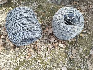 lot 395 image: Two Spools of Barbed wire