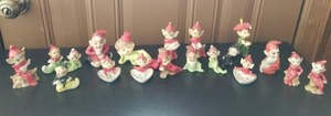 lot 171 image: Group of Glazed Ceramic Pixies