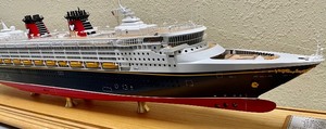 lot 226 image: Disney Magic Ship Replica in Lucite Case with a Wooden Base