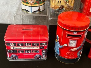 lot 132 image: Collection of Tin Metal Banks from England