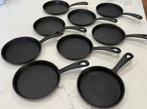 lot 145 image: 9 Small Cast Iron Skillets