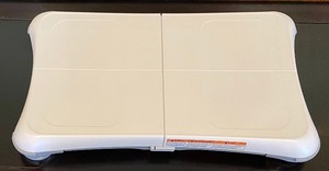 lot 274 image: Wii Balancing Board and 2 DVDs