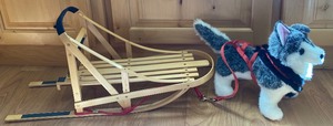 lot 424 image: American Girl Doll Sled and a Cute Husky
