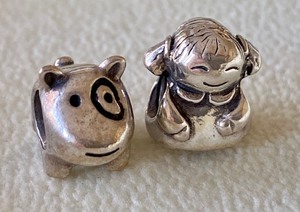 lot 441 image: Adorable Sterling Dog and Little Girl Pandora Beads