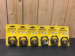 lot 9 image: Stanley 12 ft. PowerLock Tape Measure 6 units open box