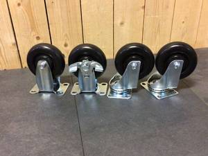lot 64 image: Husky 4 in. Caster Kit for Regular Duty Welded Steel Garage Base Cabinets Open box
