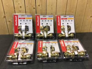 lot 68 image: Kwikset Juno Polished Brass Exterior Entry Door Knob and Double Cylinder Deadbolt Combo Pack Featuring SmartKey Security ( 6 units) open box