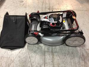 lot 103 image: Murray 21 in. 140 cc Briggs and Stratton Walk Behind Gas Push Lawn Mower with Height Adjustment and with Mulch Bag - Working Condition - Review all pictures