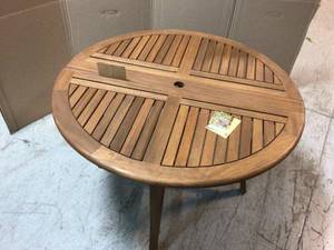 Outdoor Interiors 48 in. Dia Eucalyptus Outdoor Dining Table with Drop Leaf- Has Damage - Review all pictures