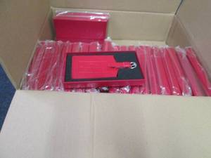 Box of 62 Promo Red Leather Luggage...