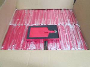 Case of 80 Promo Red Leather Luggag...