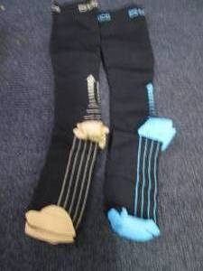 2 pair Compression Socks Retail $39...