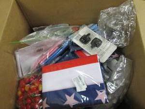box of trump flags, bottle koozies ...