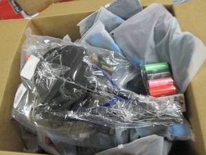 box of dog clothes , harnesses, lea...